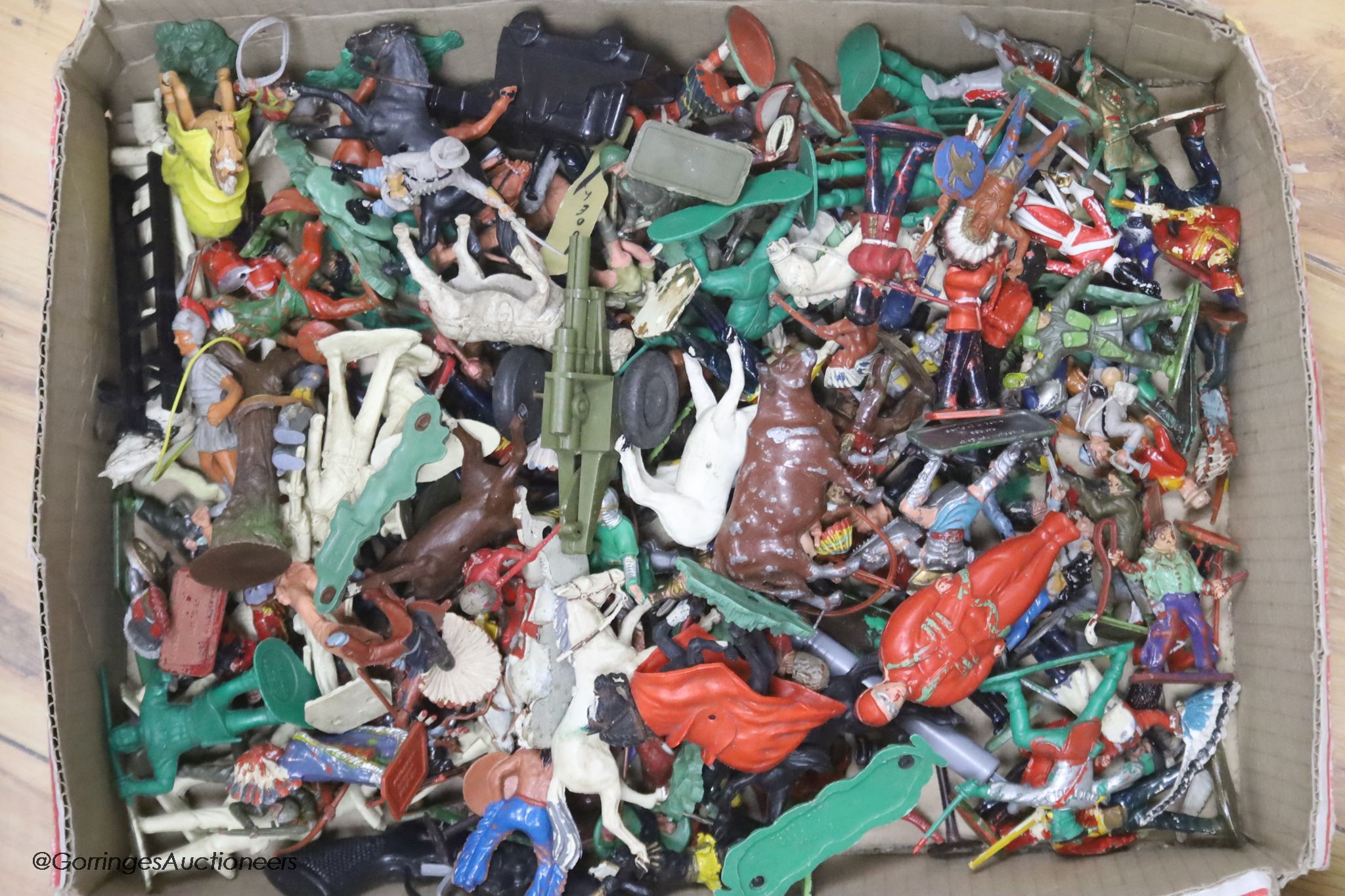 A large quantity of play worn lead figures